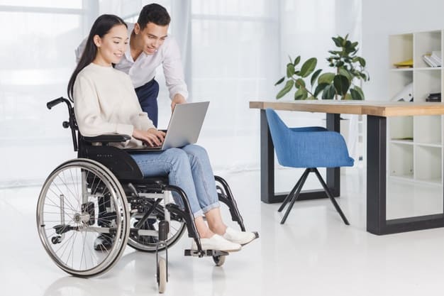 special thanks to dr katie borchert, philip philogene, natalie maclees, paige arnof-fenn, and simon nowak for sharing their expert advice for this article, smiling businessman showing something his disabled young woman laptop office